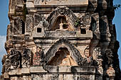 Thailand - Old Sukhothai - Wat Si Sawai. Details of stuccoed carvings of the Khmer style corncob prangs.